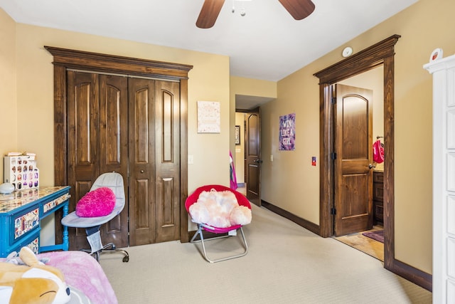 1029 Riverview Rd, Clever, MO 65631 - bedroom featuring light colored carpet, a closet, and a ceiling fan