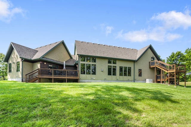 1029 Riverview Rd, Clever, MO 65631 - rear view of property featuring a deck, stairs, a yard, and stucco siding