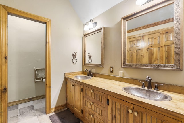1029 Riverview Rd, Clever, MO 65631 - bathroom with double vanity and vaulted ceiling