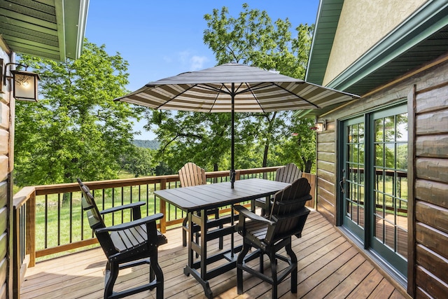 1029 Riverview Rd, Clever, MO 65631 - wooden terrace featuring outdoor dining space