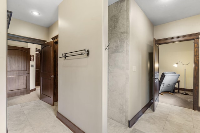 1029 Riverview Rd, Clever, MO 65631 - corridor featuring light tile patterned floors and light carpet