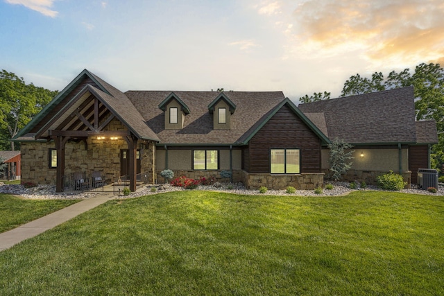 1029 Riverview Rd, Clever, MO 65631 - craftsman inspired home with stone siding, a front lawn, and a shingled roof