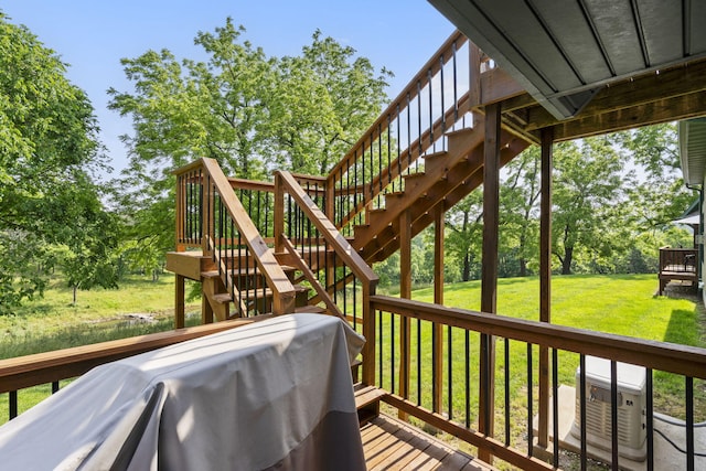 1029 Riverview Rd, Clever, MO 65631 - deck featuring stairs, a lawn, and view of wooded area