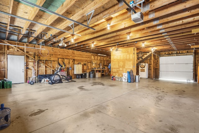 1029 Riverview Rd, Clever, MO 65631 - garage featuring a garage door opener