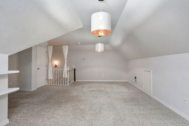 713 River Rock Ct, Nixa, MO 65714 - additional living space with carpet flooring and lofted ceiling