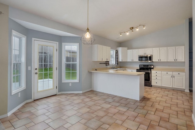 713 River Rock Ct, Nixa, MO 65714 - kitchen featuring appliances with stainless steel finishes, a peninsula, light countertops, white cabinets, and pendant lighting