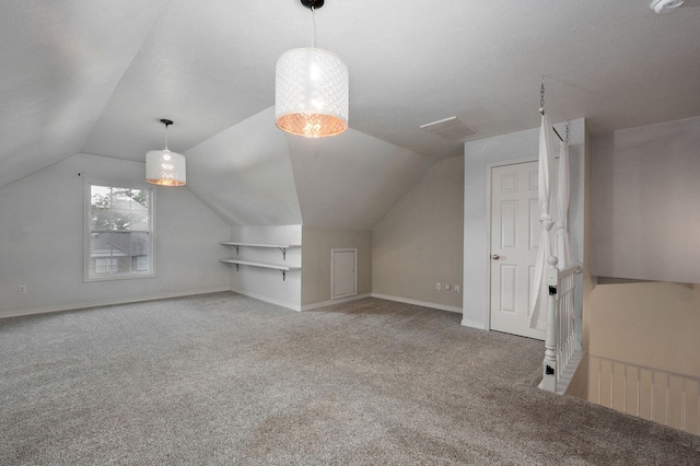 713 River Rock Ct, Nixa, MO 65714 - additional living space featuring carpet floors and vaulted ceiling