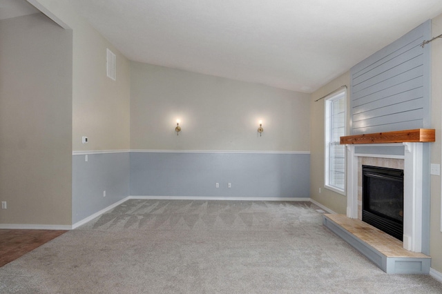 713 River Rock Ct, Nixa, MO 65714 - unfurnished living room with carpet flooring and a fireplace