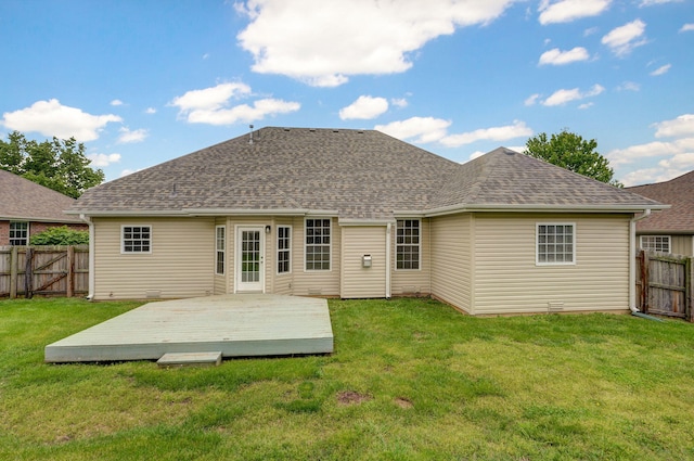 713 River Rock Ct, Nixa, MO 65714 - back of house featuring a fenced backyard, a wooden deck, and a shingled roof