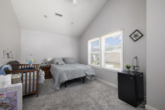 817 W Walnut St, Springfield, MO 65806 - carpeted bedroom with lofted ceiling and baseboards
