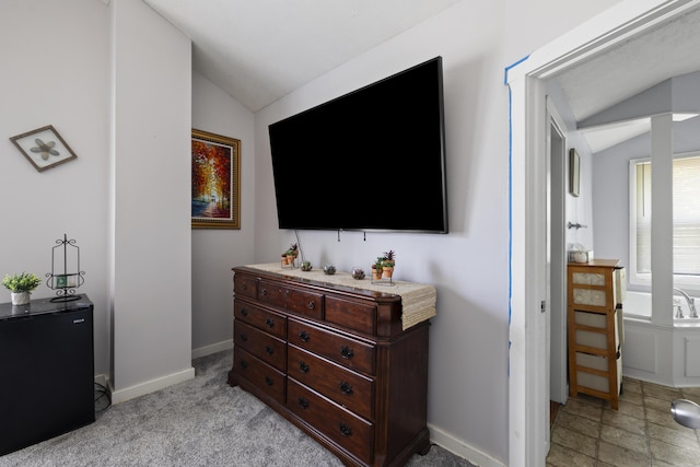 817 W Walnut St, Springfield, MO 65806 - bedroom featuring lofted ceiling and baseboards