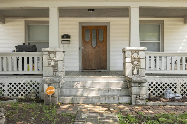 817 W Walnut St, Springfield, MO 65806 - view of exterior entry with a porch