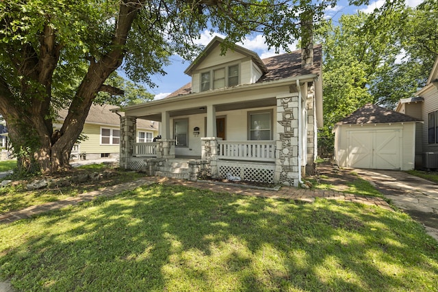 817 W Walnut St, Springfield, MO 65806 - bungalow-style home featuring a storage shed, a porch, a chimney, concrete driveway, and a front lawn
