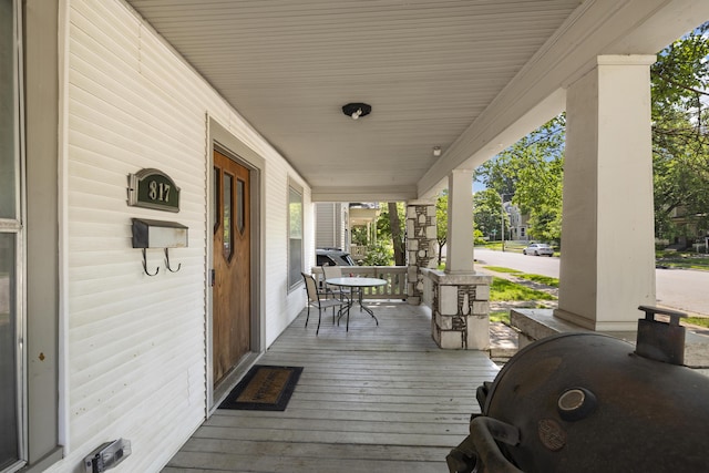 817 W Walnut St, Springfield, MO 65806 - wooden porch with area for grilling