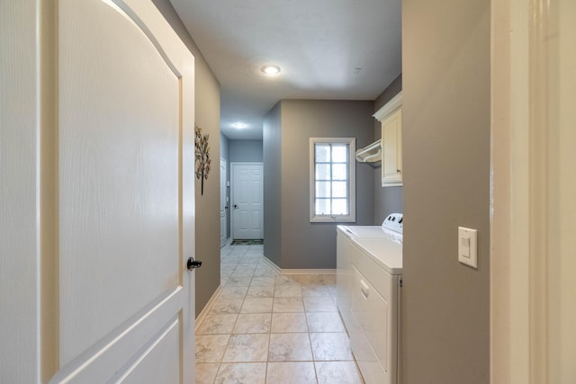 4910 S Stanton Ave, Springfield, MO 65810 - washroom with cabinet space and washer and dryer