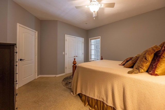 4910 S Stanton Ave, Springfield, MO 65810 - bedroom with light colored carpet, a closet, and a ceiling fan