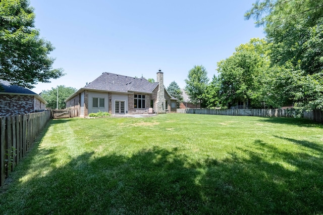 4910 S Stanton Ave, Springfield, MO 65810 - fenced backyard with french doors