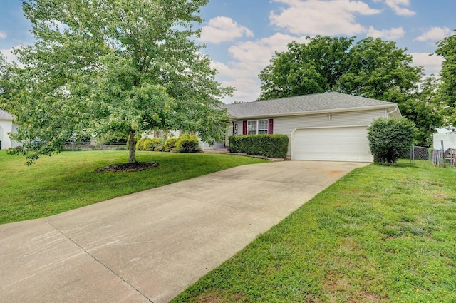 1651 S Mahn Ct, Springfield, MO 65802 - view of front of house featuring a garage and concrete driveway