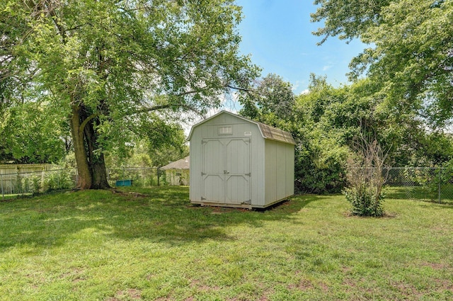 1651 S Mahn Ct, Springfield, MO 65802 - view of shed with a fenced backyard