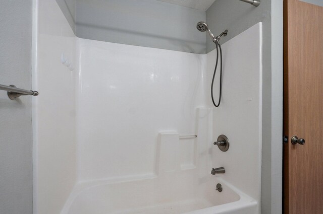 1651 S Mahn Ct, Springfield, MO 65802 - bathroom with shower / washtub combination