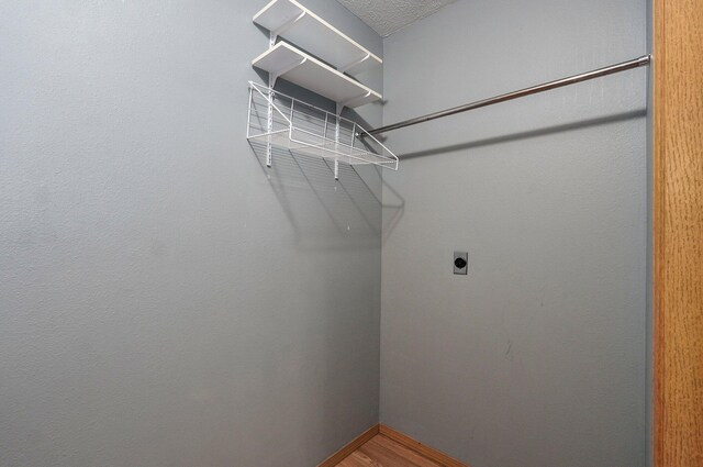 1651 S Mahn Ct, Springfield, MO 65802 - spacious closet featuring wood finished floors