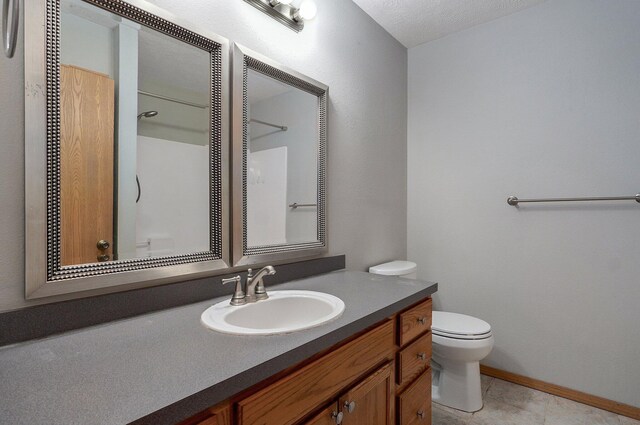 1651 S Mahn Ct, Springfield, MO 65802 - full bathroom featuring vanity, a shower, and tile patterned flooring
