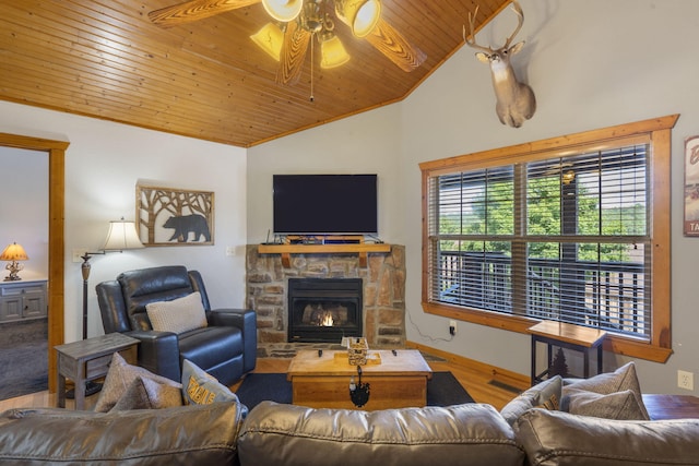 76 Bells Ave Unit 98, Branson West, MO 65737 - living room with vaulted ceiling, a ceiling fan, wood ceiling, wood finished floors, and a stone fireplace