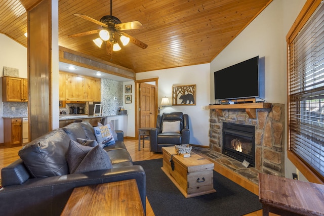 76 Bells Ave Unit 98, Branson West, MO 65737 - living room featuring wood ceiling, ceiling fan, a stone fireplace, and wood finished floors