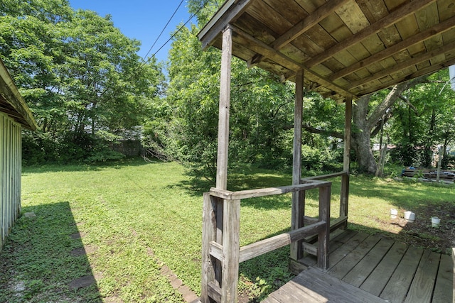 1123 W Hovey St, Springfield, MO 65802 - wooden deck featuring a lawn