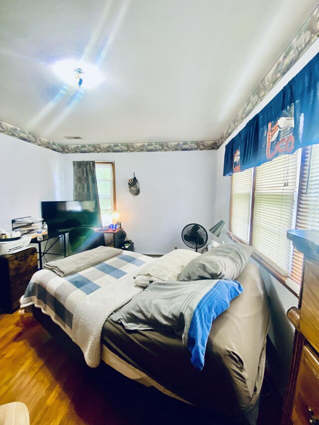 513 Meng St, Greenfield, MO 65661 - bedroom featuring wood finished floors