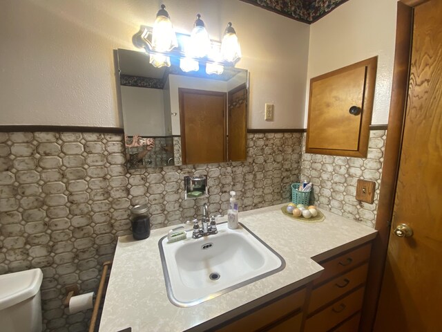 513 Meng St, Greenfield, MO 65661 - bathroom with vanity, tile walls, and wainscoting