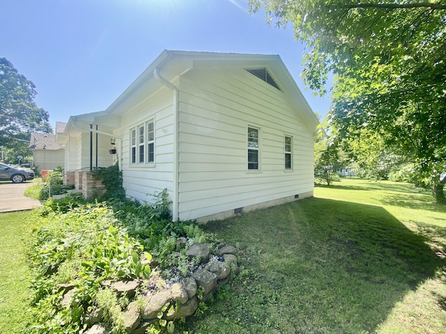513 Meng St, Greenfield, MO 65661 - view of side of home with crawl space and a yard