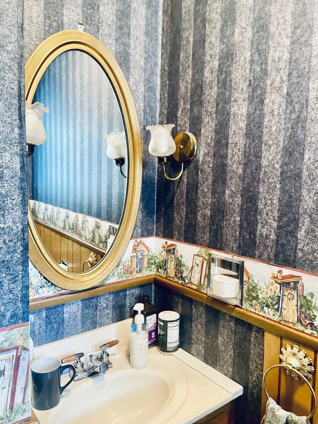 513 Meng St, Greenfield, MO 65661 - bathroom featuring wallpapered walls and vanity