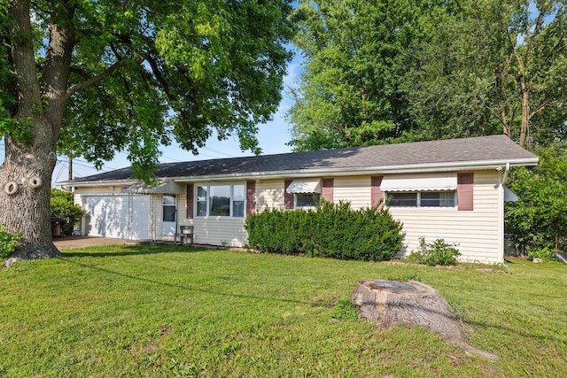 2324 N Fulbright Ave, Springfield, MO 65803 - ranch-style house featuring an attached garage and a front lawn