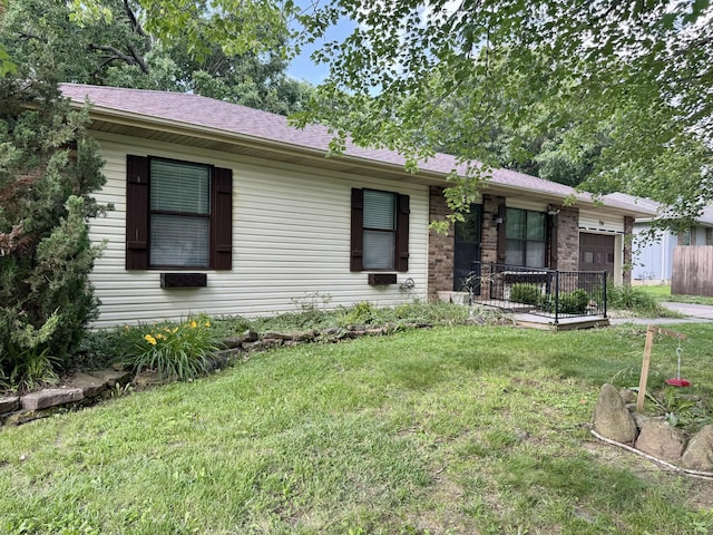 701 Barracuda Dr, Nixa, MO 65714 - single story home with an attached garage and a shingled roof