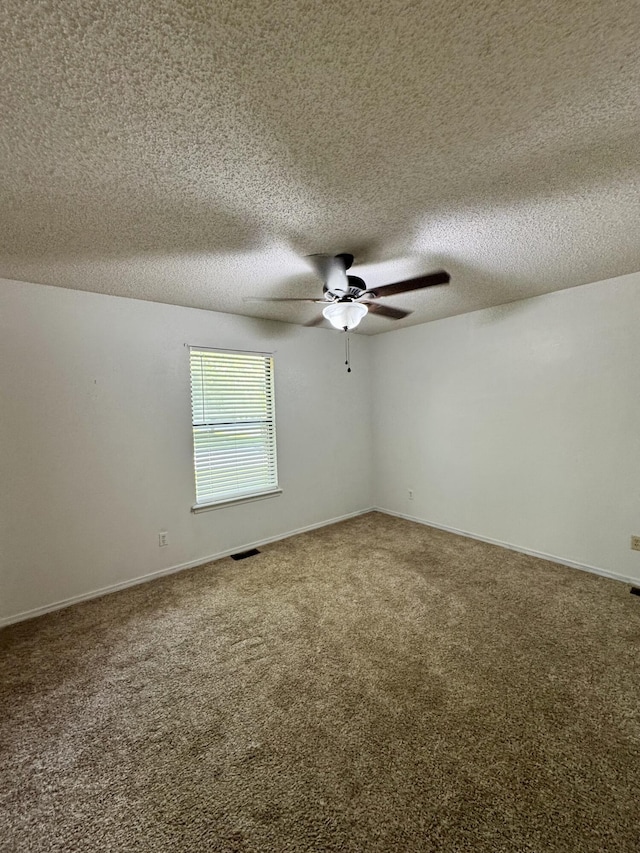 701 Barracuda Dr, Nixa, MO 65714 - carpeted spare room with ceiling fan and a textured ceiling