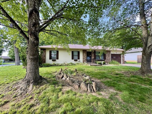 701 Barracuda Dr, Nixa, MO 65714 - ranch-style house featuring an attached garage, driveway, and stone siding