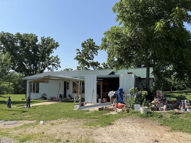12 Willhoit Ln, Theodosia, MO 65761 - back of house with a lawn and a metal roof