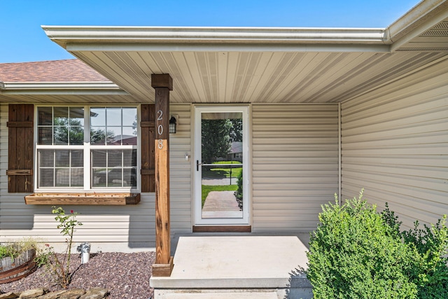 208 Dixie Ave, Clever, MO 65631 - view of exterior entry featuring a shingled roof