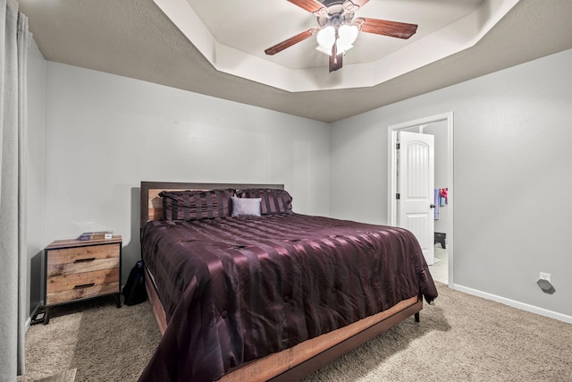 208 Dixie Ave, Clever, MO 65631 - bedroom with carpet flooring, a tray ceiling, and ceiling fan