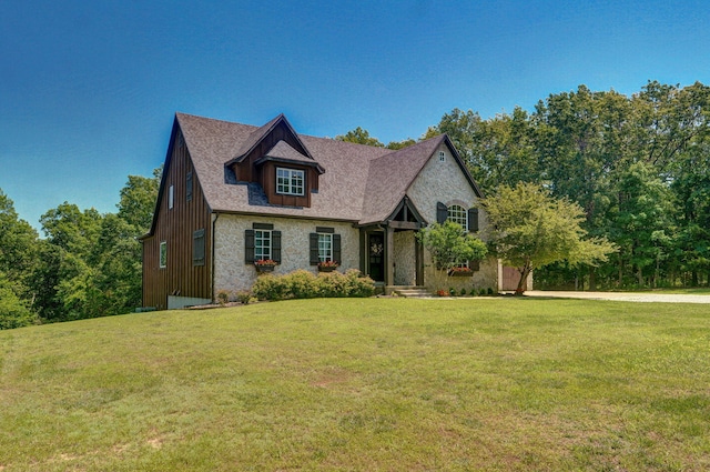 7607 N Angler Ln, Strafford, MO 65757 - view of front of home featuring a front yard and stone siding