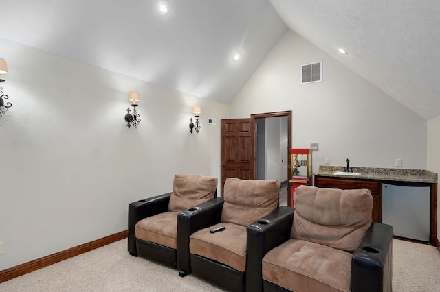 7607 N Angler Ln, Strafford, MO 65757 - home theater featuring light carpet, vaulted ceiling, wet bar, and recessed lighting