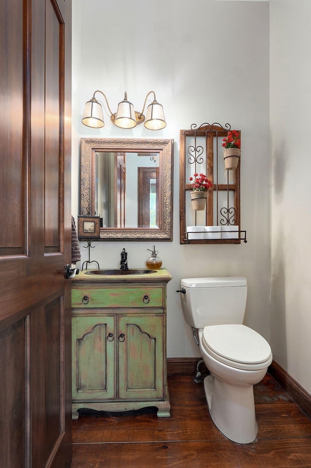 7607 N Angler Ln, Strafford, MO 65757 - half bathroom with vanity and wood finished floors