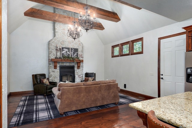 7607 N Angler Ln, Strafford, MO 65757 - living room featuring dark wood-type flooring, a chandelier, and a stone fireplace