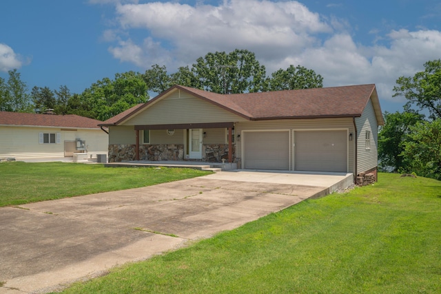 26307 Twin Rivers Dr, Shell Knob, MO 65747 - view of front of house featuring a garage, a front yard, a porch, and concrete driveway