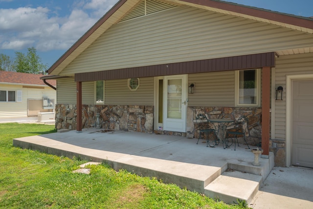 26307 Twin Rivers Dr, Shell Knob, MO 65747 - rear view of house with stone siding and a porch