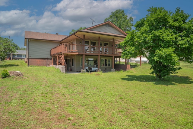 26307 Twin Rivers Dr, Shell Knob, MO 65747 - rear view of house with a wooden deck, a lawn, stairs, and an outdoor fire pit