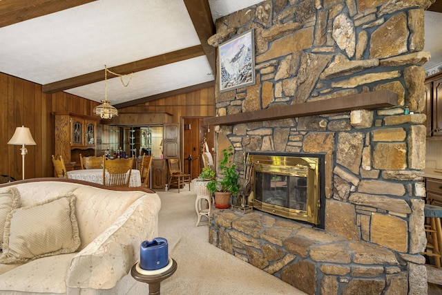 26307 Twin Rivers Dr, Shell Knob, MO 65747 - carpeted living area featuring wooden walls, a chandelier, and a fireplace