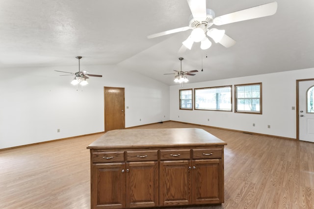 29474 Farm Rd Unit 1260, Golden, MO 65658 - kitchen with ceiling fan, lofted ceiling, light wood finished floors, open floor plan, and a center island