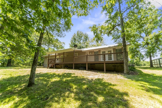 29474 Farm Rd Unit 1260, Golden, MO 65658 - back of property featuring a lawn and a wooden deck